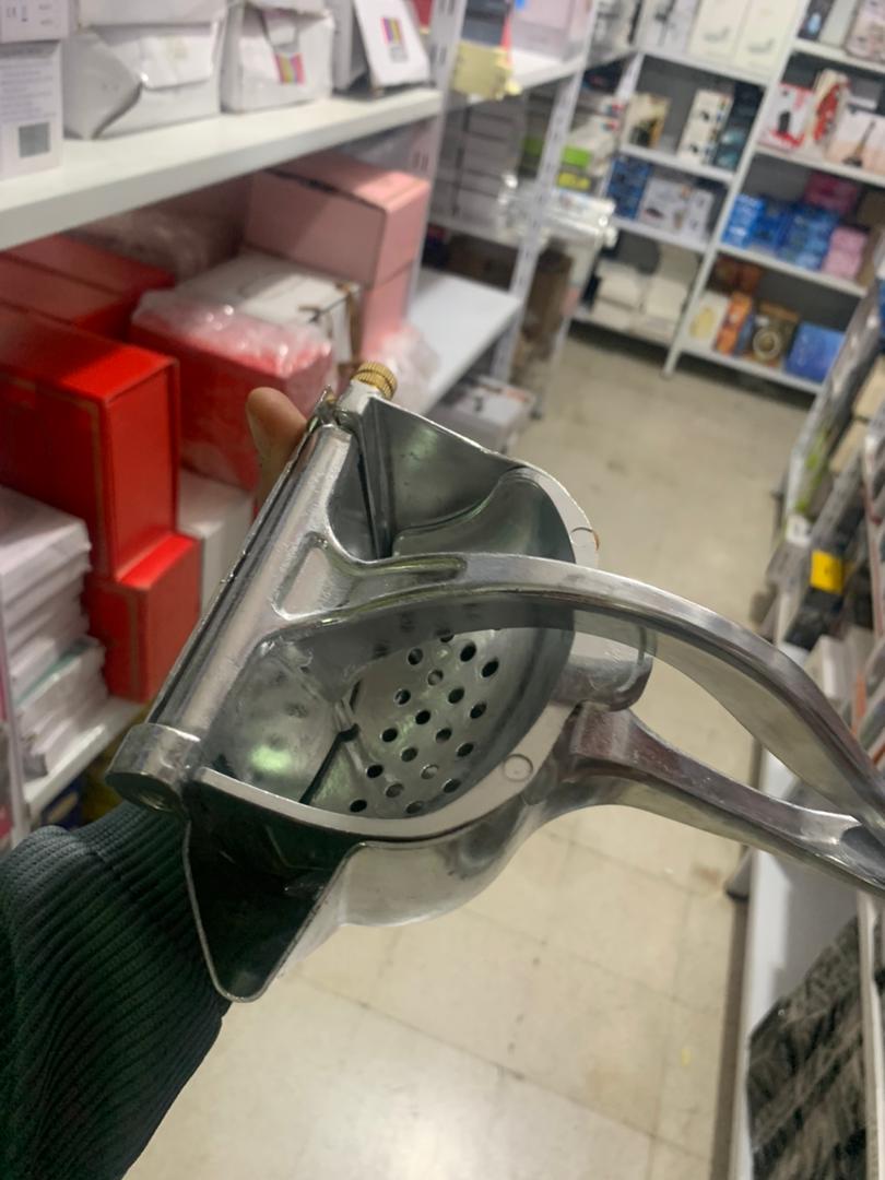 عصارة فواكه يدوية فعالة وسهلة التنظيف غير قابلة للصدأ